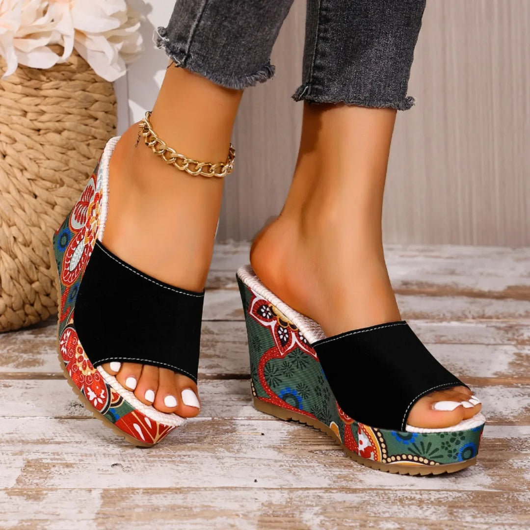 Talora - Sculptural Mules With a Floral Heel