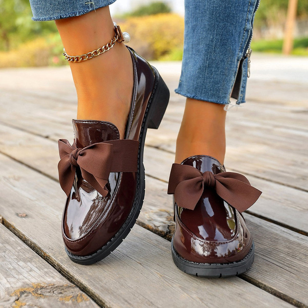 Astreaica - Patent Leather Loafer With Bow Accent