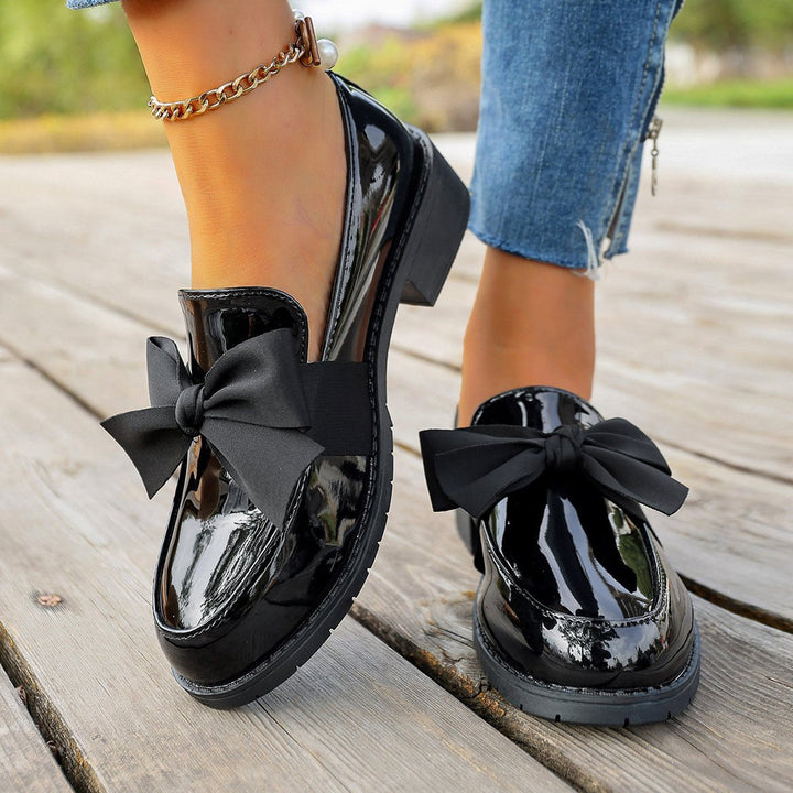 Astreaica - Patent Leather Loafer With Bow Accent