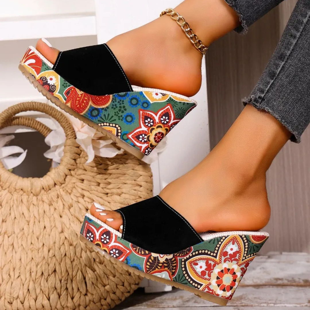Talora - Sculptural Mules With a Floral Heel