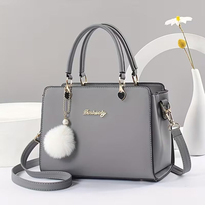 Samietta - Handbag With Pom-Pom Charm and Shoulder Strap