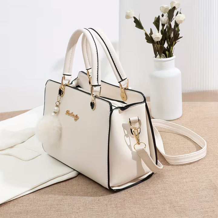 Samietta - Handbag With Pom-Pom Charm and Shoulder Strap
