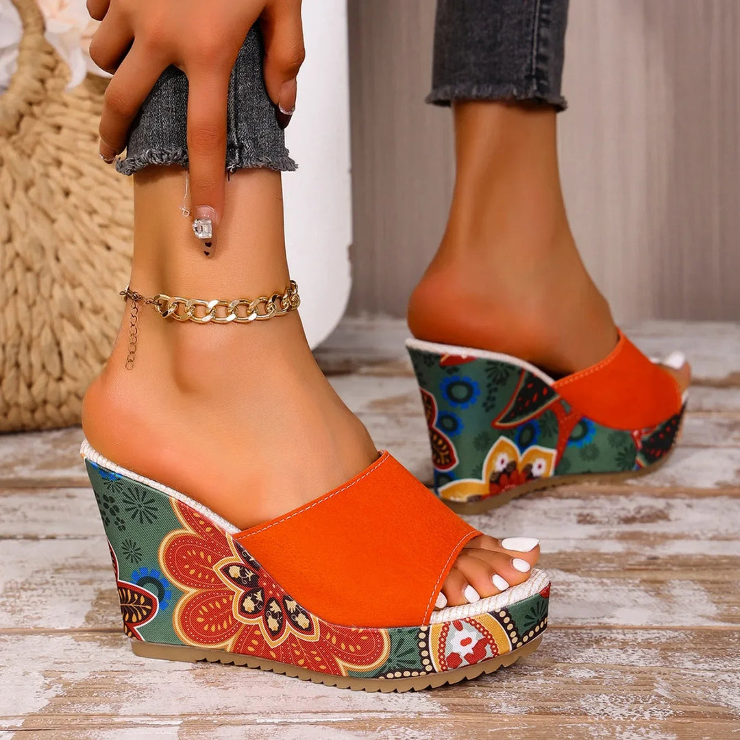 Talora - Sculptural Mules With a Floral Heel