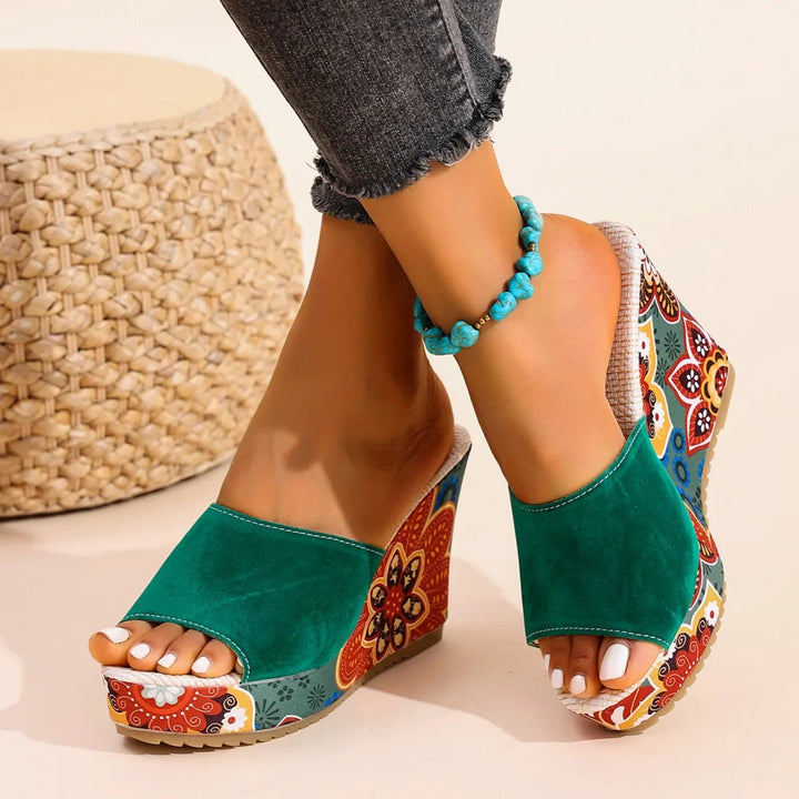 Talora - Sculptural Mules With a Floral Heel